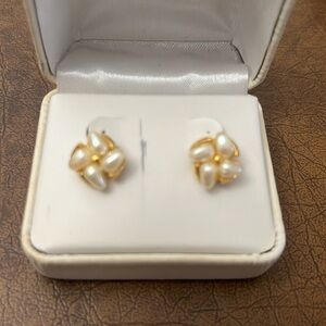Gold colored costume jewelry clip on earrings with pearls